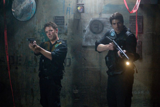 Illustration for article titled Your first look at the "monsters versus security guards" flick Cost of Living
